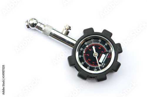 Murais de parede tyre pressure gage on white floor