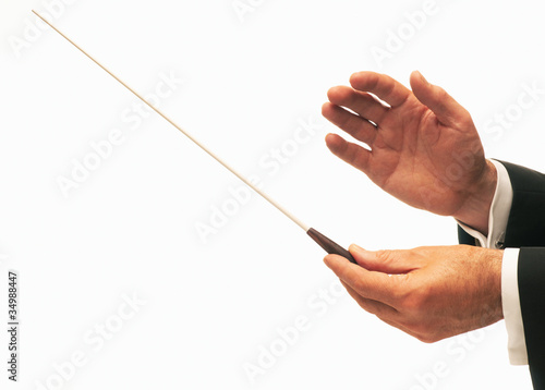 Conductor conducting an orchestra