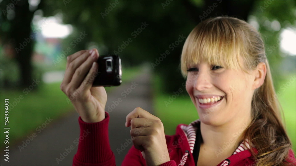 Woman using smartphone on the way Woman using smartphone on the way