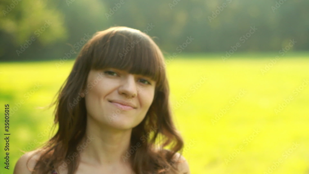 Young happy beautiful woman on the meadow Young happy beautiful woman on the meadow