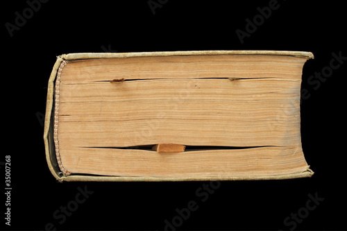 books looking like a face, isolated on black
