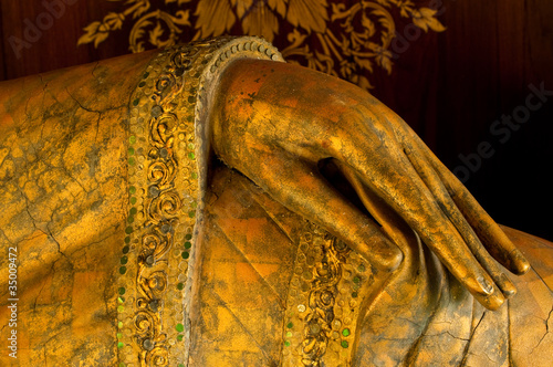 Hand of reclining buddha made from wood