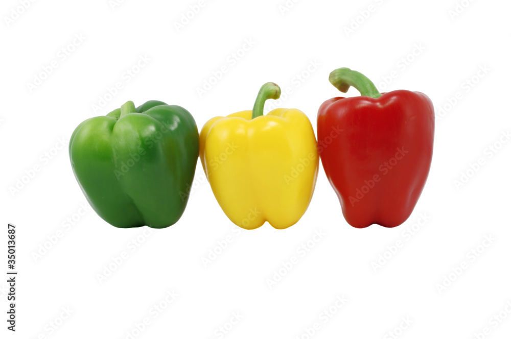 Green, Red And Yellow Capsicum In A Row Green, Red And Yellow Capsicum In A Row