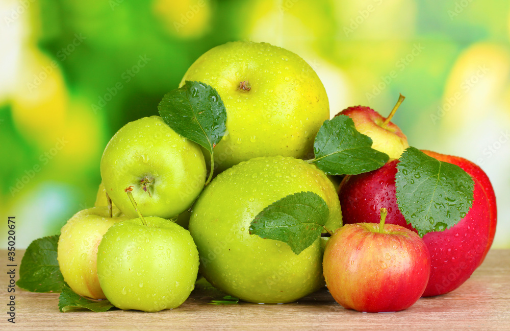 Fresh organic apples on wooden table isolated on white Fresh organic apples on wooden table isolated on white