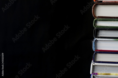 Stack of books isolated on a black background