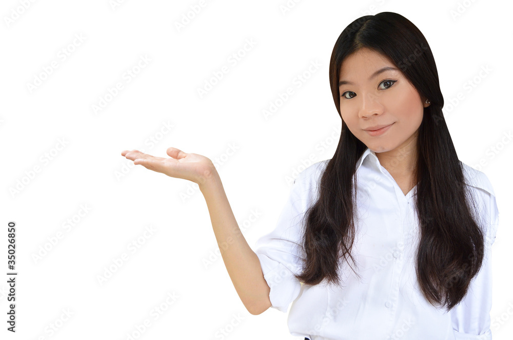 Business woman with her hand open to show a product Business woman with her hand open to show a product