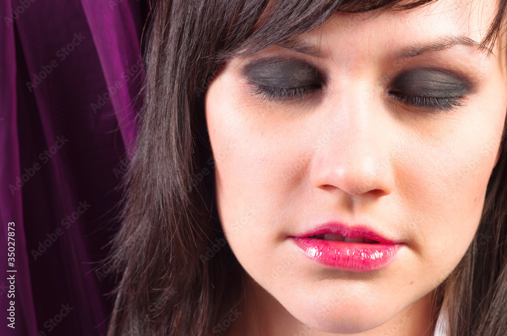 Closeup of a young woman with beautiful makeup Closeup of a young woman with beautiful makeup