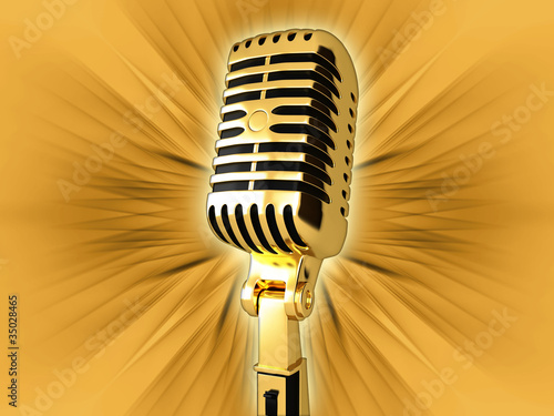 Gold vintage microphone on the background