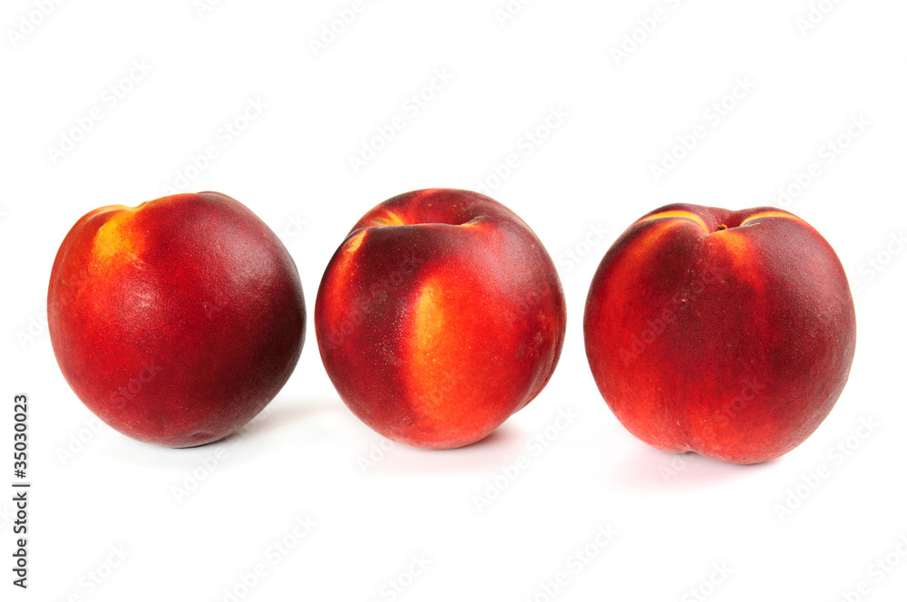 Three fresh ripe peach
