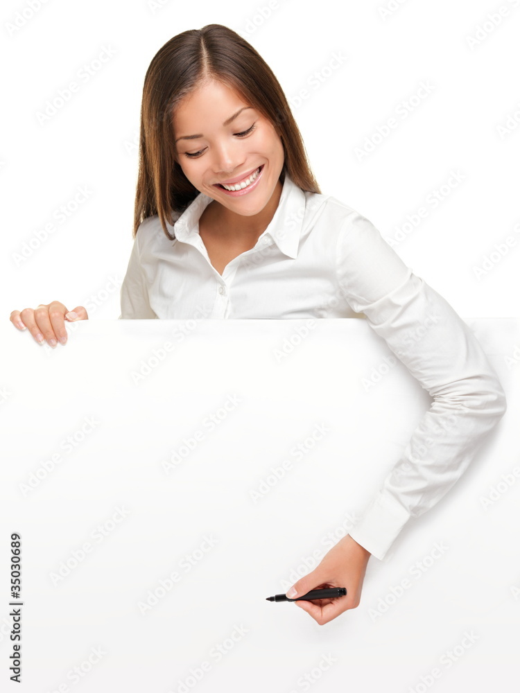 Woman writing on whiteboard sign Woman writing on whiteboard sign