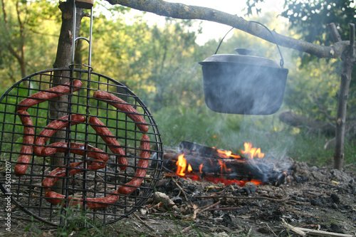Sausages on a grill