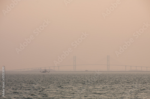 Shrimp Boat by Bridge in Dusky Fog