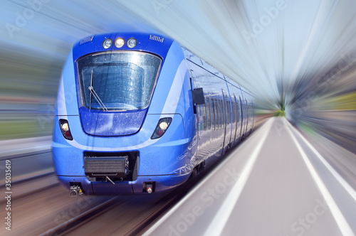 blue train in motion