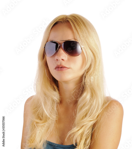 Beautiful girl wearing aviator sunglasses, isolated