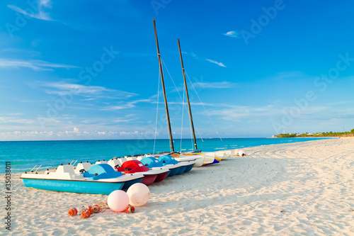 Photography Sailing boats and water bikes in the cuban beach of Varadero