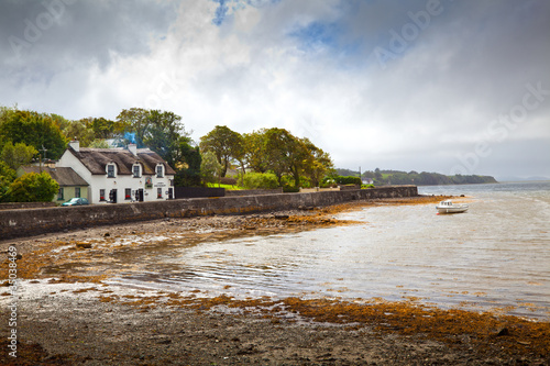 Irish Tatched Country Cottage Pub On The Seaside photo