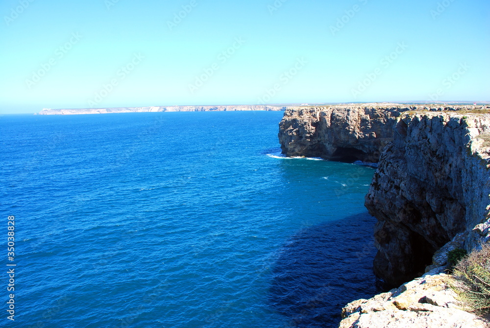 The monumental cliffs at coast near Sagres point in Portugal