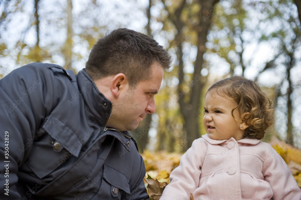 Portrait with dad and daughter talking Portrait with dad and daughter talking