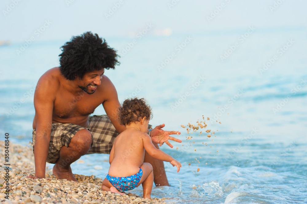 Fototapeta premium First summer on the beach