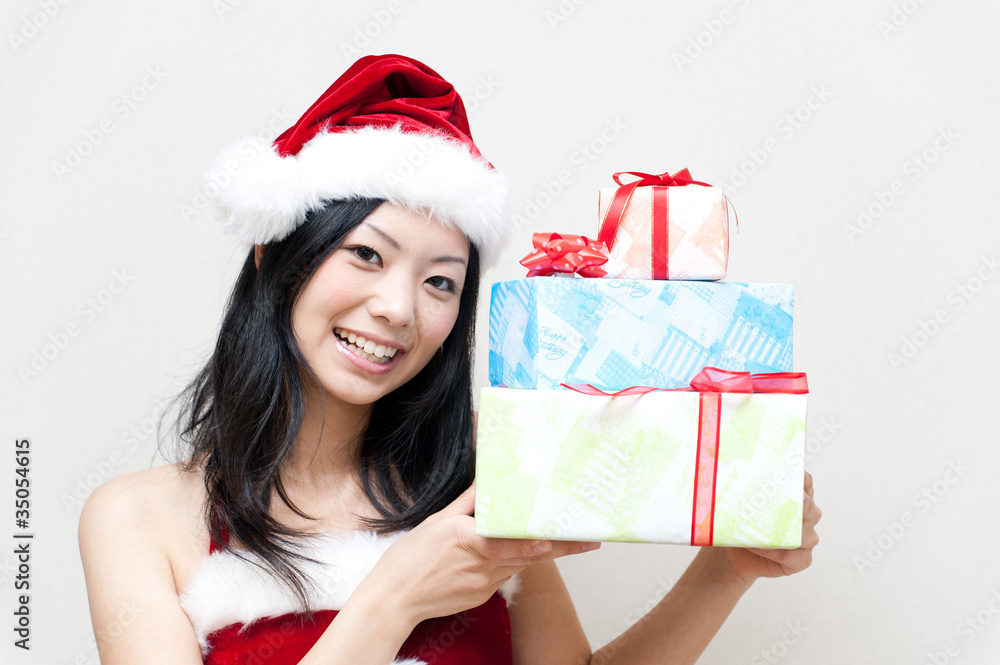 a portrait of attractive asian santa claus a portrait of attractive asian santa claus