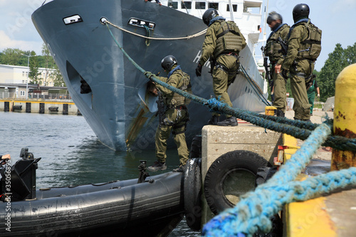 Soldiers marines  boarding a ship in a simulated assault