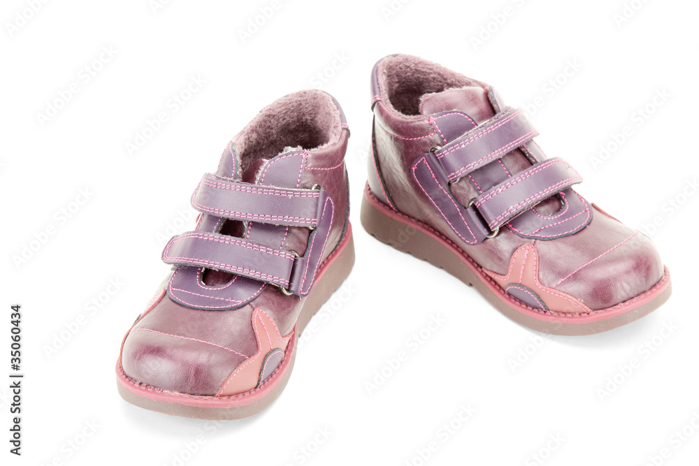 Fall shoes for little girl over white background