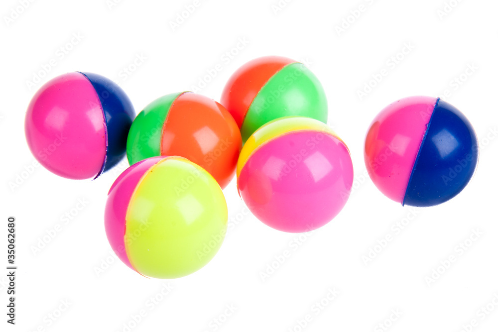 Six colorful rubber balls isolated on white