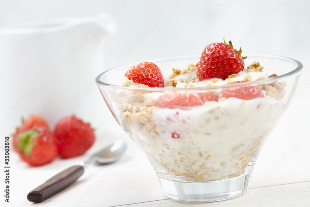 Milk with cereal and strawberries Milk with cereal and strawberries