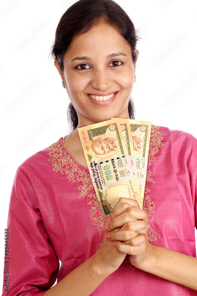 Woman holding Indian currency Woman holding Indian currency