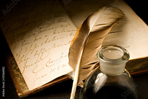 Old book with feather and inkpot #35066082