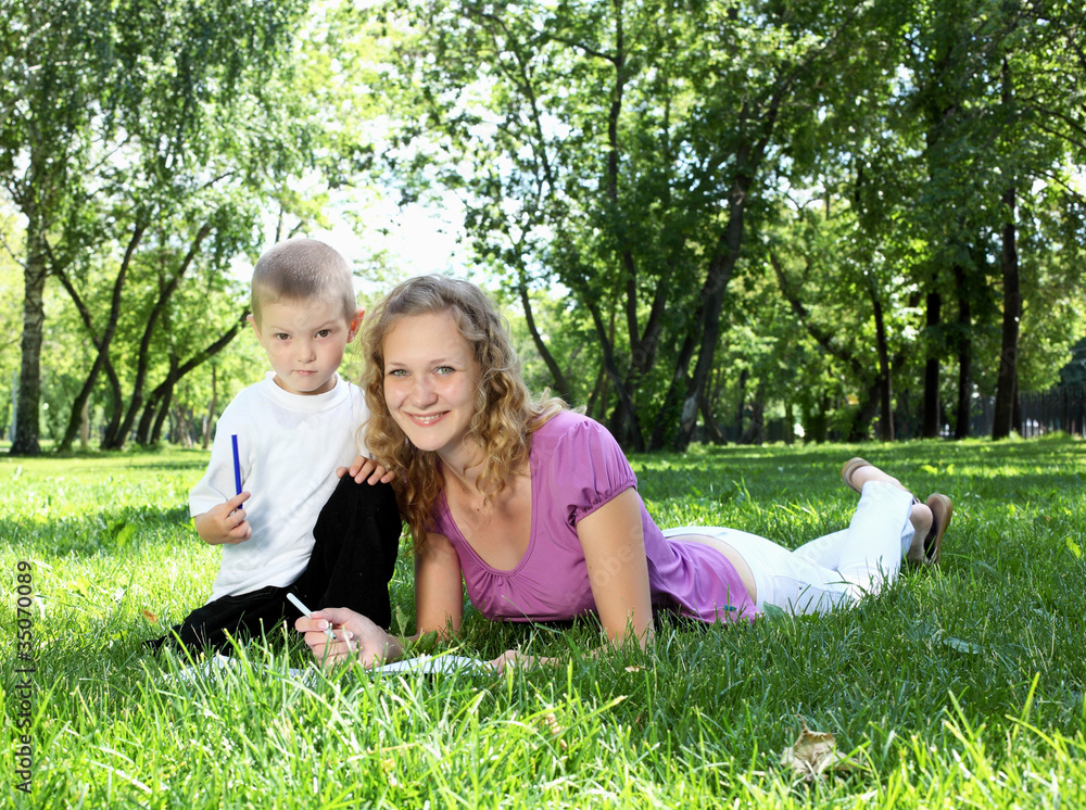 Fototapeta premium Mother with little son in the park