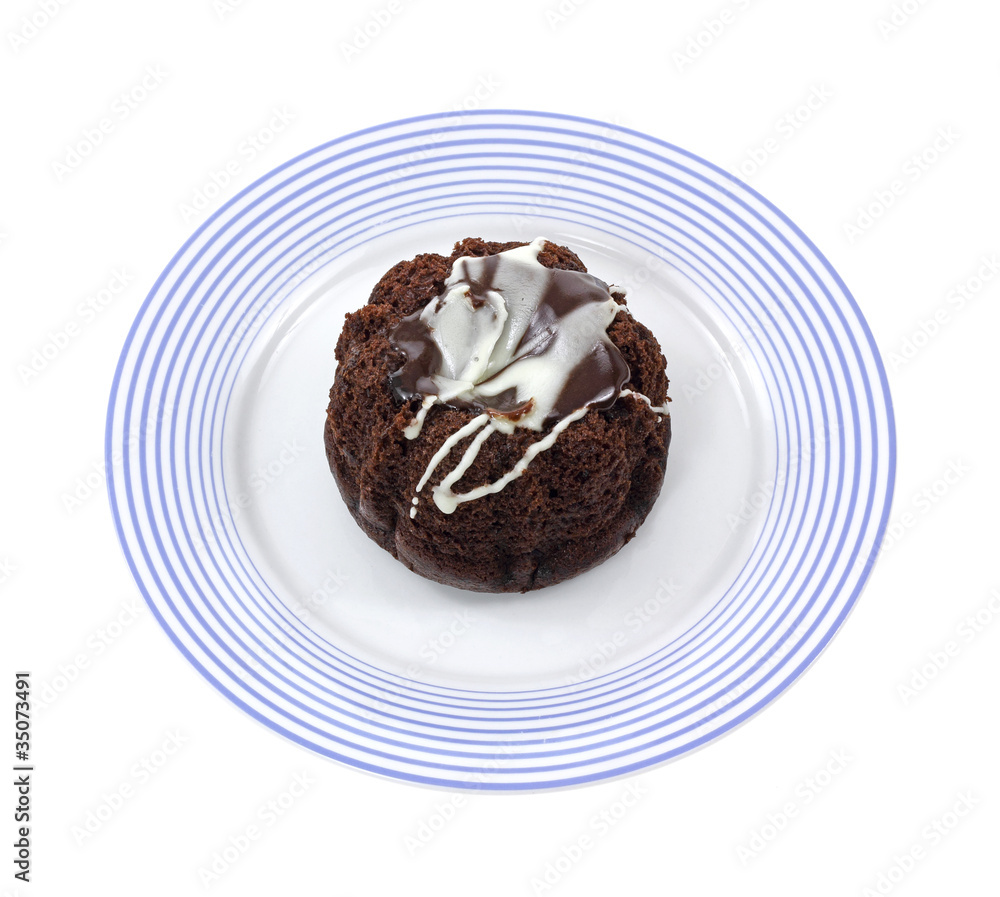 Chocolate lava cake on blue plate Chocolate lava cake on blue plate