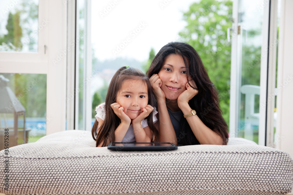 Mother and Daughter with Digital Tablet Mother and Daughter with Digital Tablet