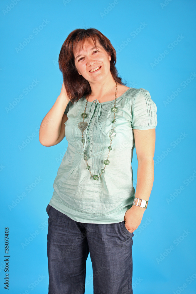 fashion woman on blue background studio shot fashion woman on blue background studio shot