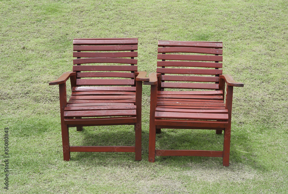 Two red chairs in the garden Two red chairs in the garden
