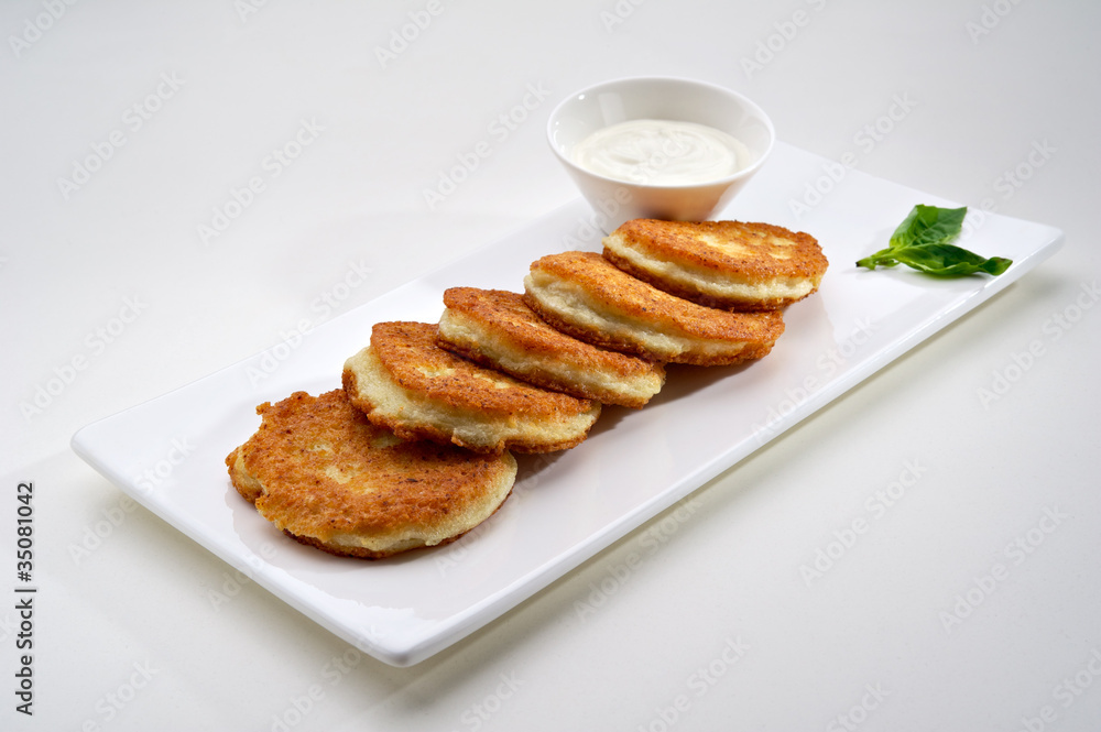 Potato pancakes with sour cream Potato pancakes with sour cream