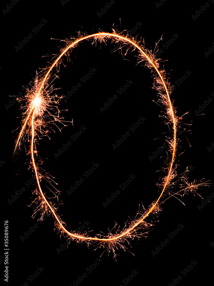 Digit 0 made of sparklers isolated on black Digit 0 made of sparklers isolated on black