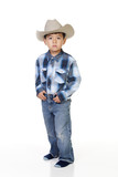 Boy wears cowboy outfit.