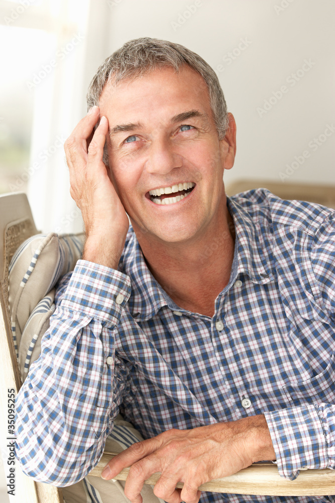 Mid age man at home Mid age man at home