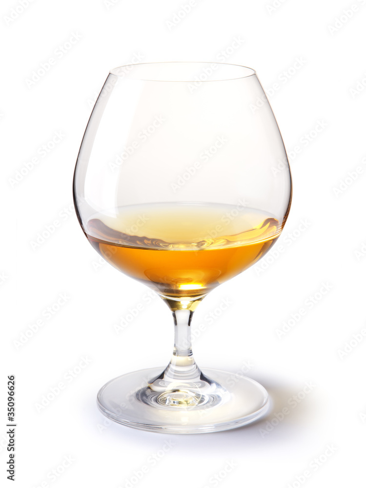 cognac glass with gold cognac on a white with shadow cognac glass with gold cognac on a white with shadow
