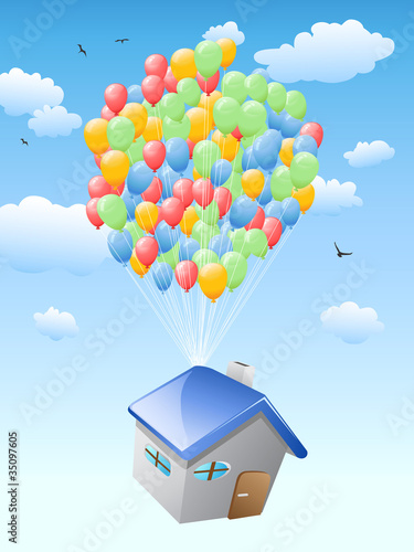house with balloons flying in the blue sky