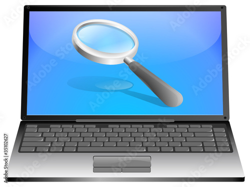 Laptop mit Lupe