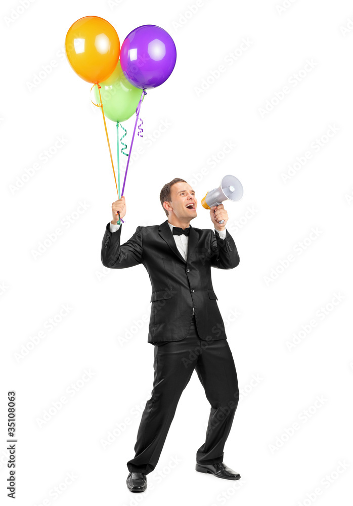 Man yelling throw a megaphone and holding balloons Man yelling throw a megaphone and holding balloons