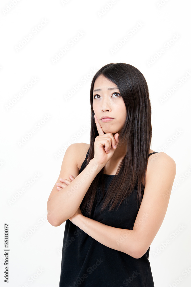 a portrait of attractive asian woman thinking a portrait of attractive asian woman thinking