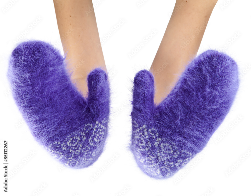 Hands in fluffy lilac mittens Hands in fluffy lilac mittens