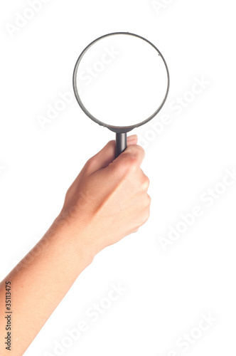 hand and the magnifying glass