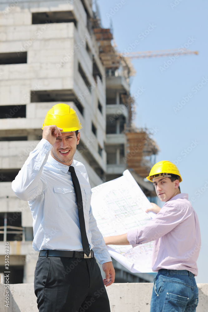 Team of architects on construciton site Team of architects on construciton site