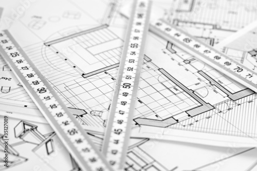 metric folding ruler and architectural drawings © Uladzimir