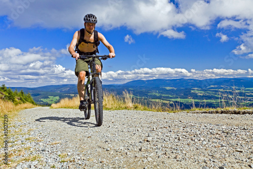 Fototapeta Naklejka Na Ścianę i Meble -  Mountain biker riding a bike