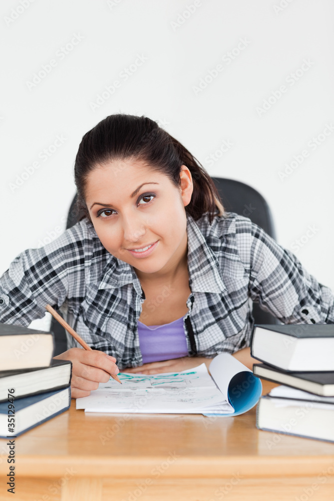 Cute young student looking to camera Cute young student looking to camera